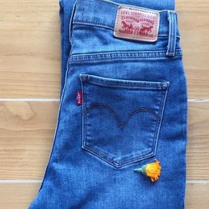 Light blue high rise Levi Jeans